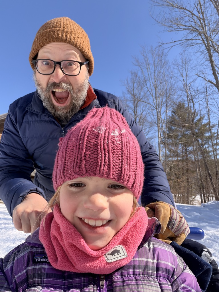 Mr. Coleman's class at HVNC having fun on kick sleds and tracking an otter through the snow.