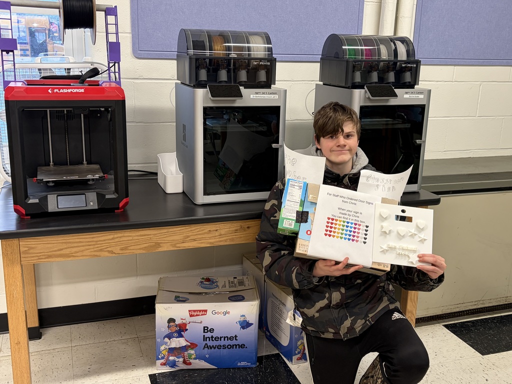 Chris has been 3D printing room signs for staff.