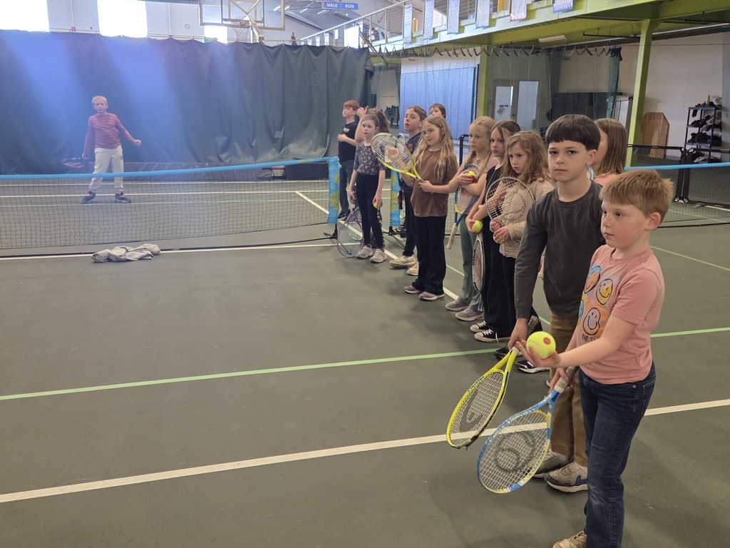 Ms. Tracy's class wrapped up their month of tennis lessons at the Y with Ms. Georgia. They had a blast and improved their skills.