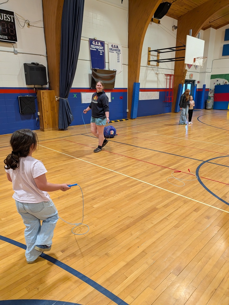 GSB 8th grade students helping Ms. Erin in PE