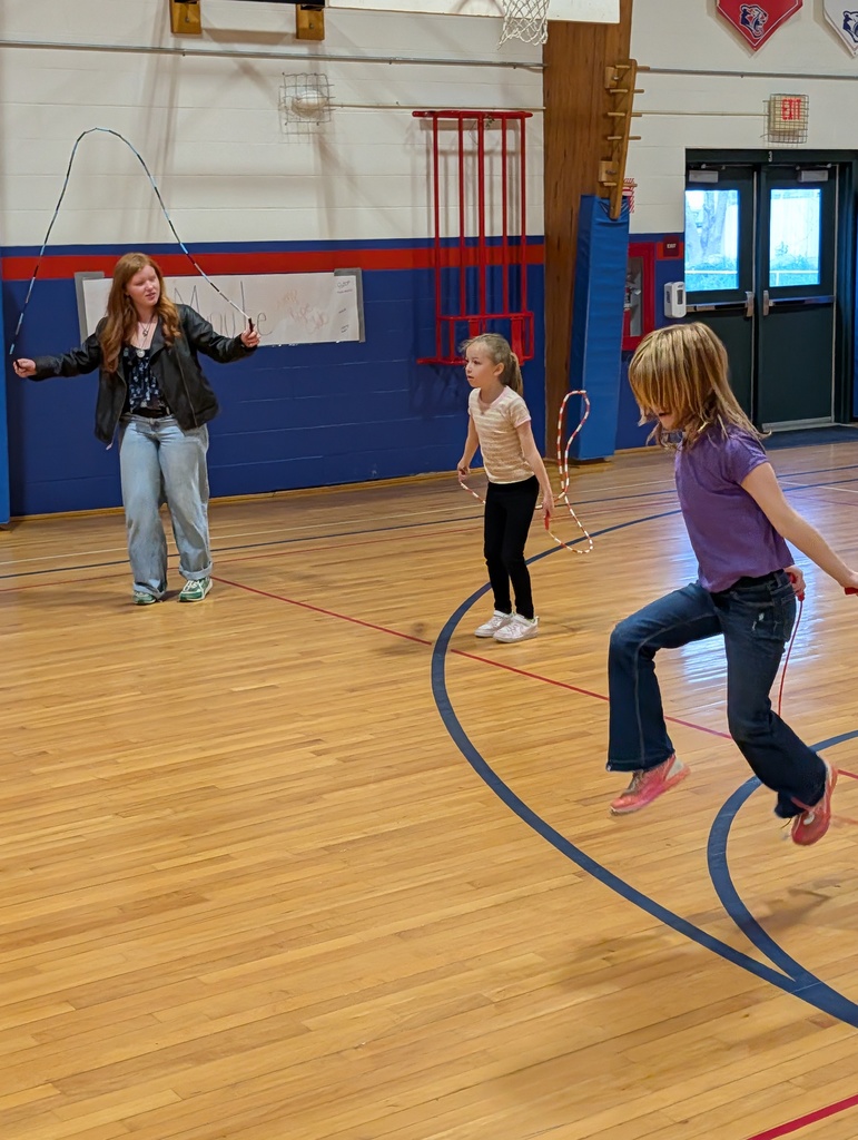 GSB 8th grade students helping Ms. Erin in PE