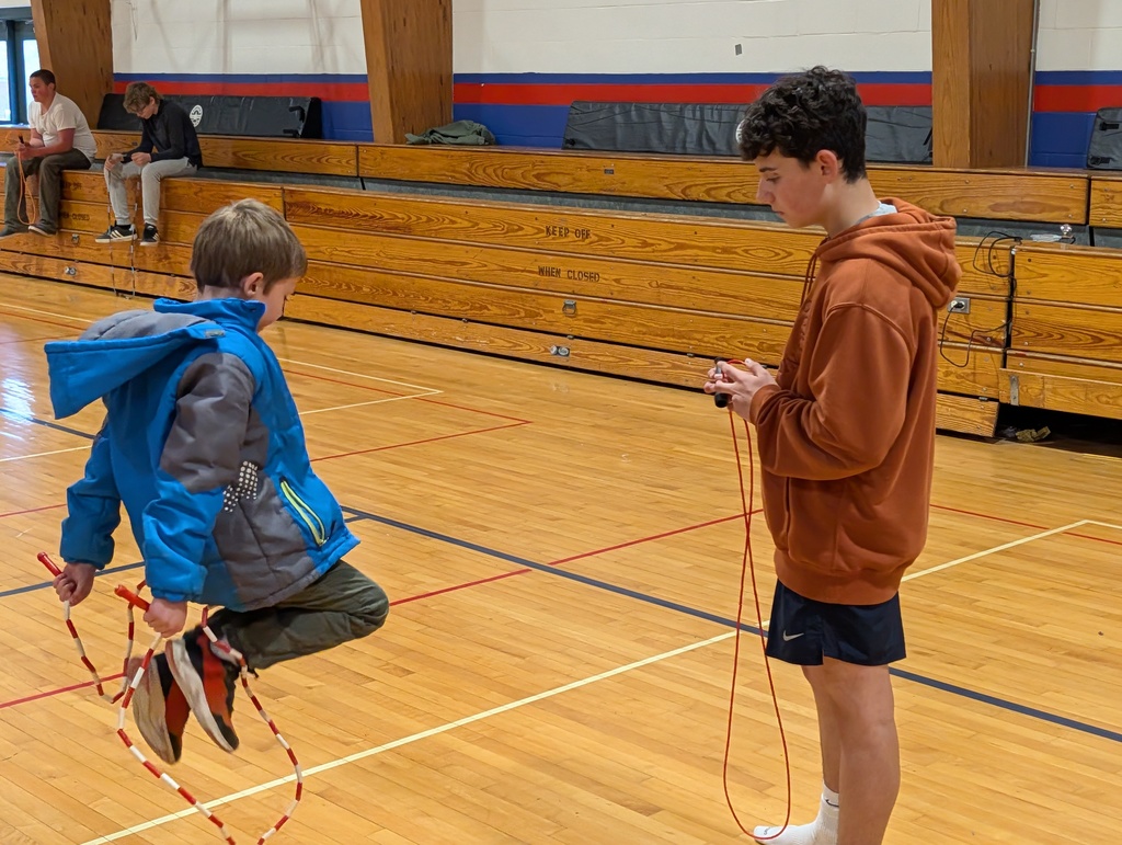 GSB 8th grade students helping Ms. Erin in PE
