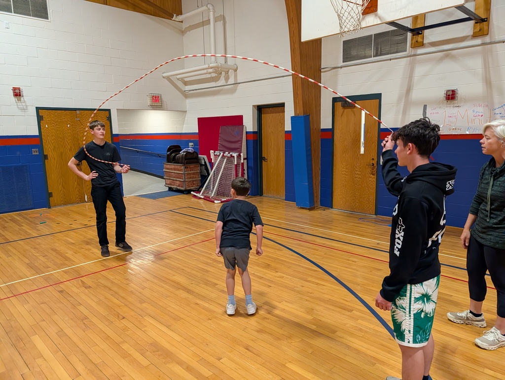 GSB 8th grade students helping Ms. Erin in PE