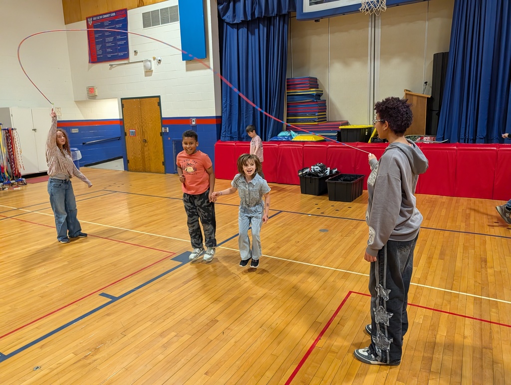 GSB 8th grade students helping Ms. Erin in PE