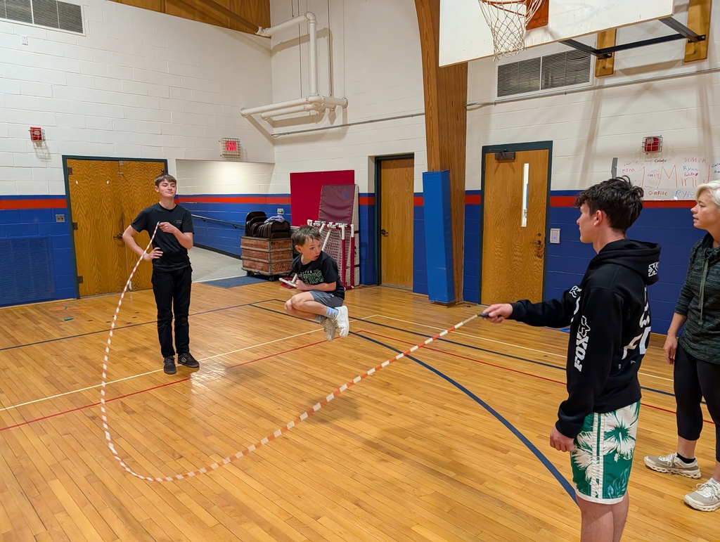 GSB 8th grade students helping Ms. Erin in PE