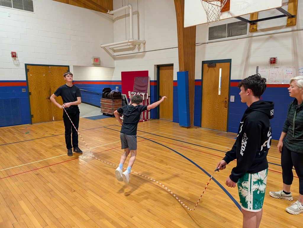 GSB 8th grade students helping Ms. Erin in PE