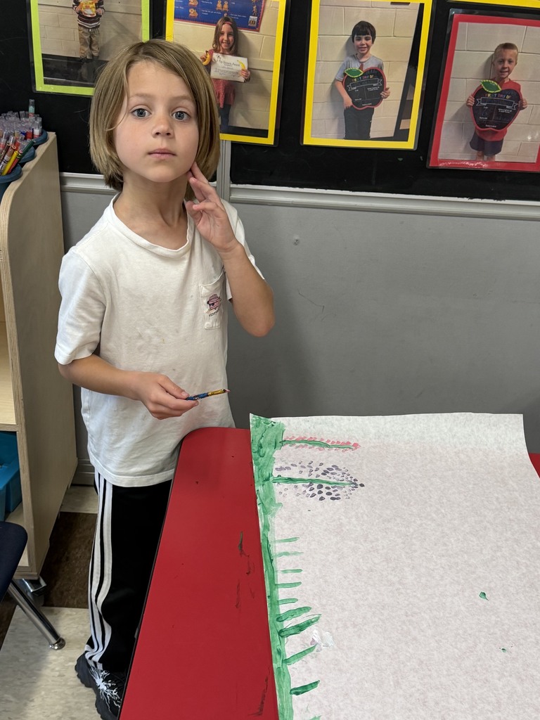 Lupine painting with Ms. Stacey after reading Miss Rumphius!