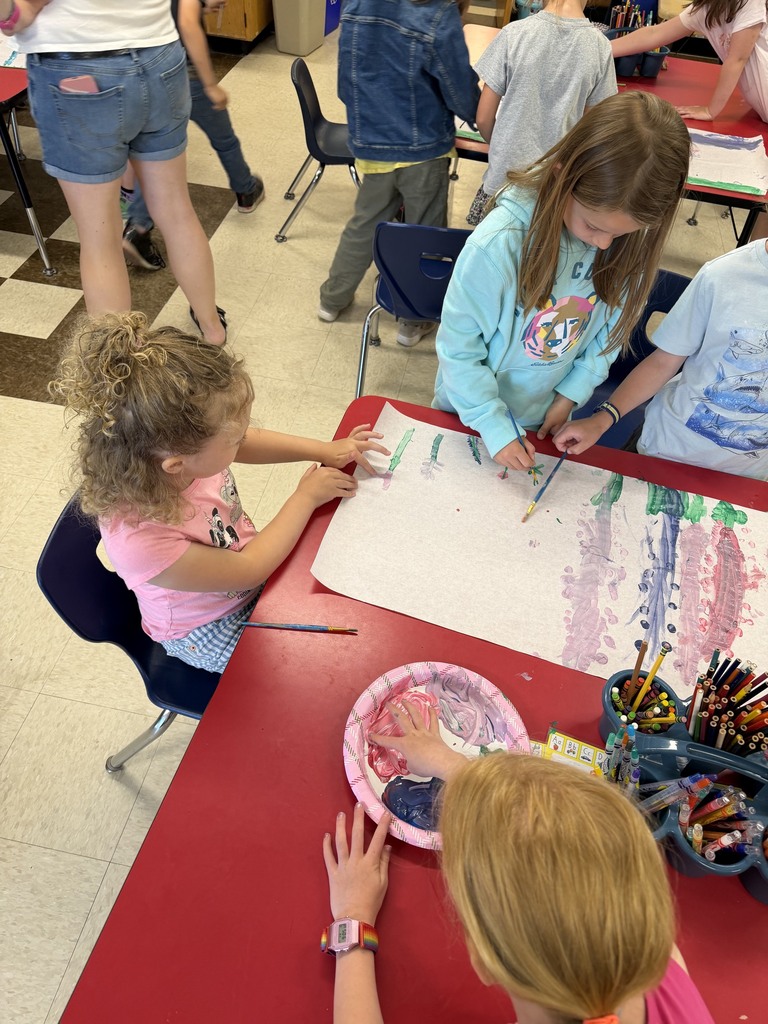 Lupine painting with Ms. Stacey after reading Miss Rumphius!
