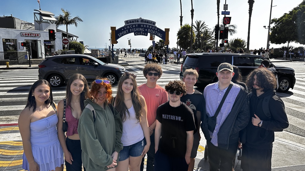 students standing on Santa Monica beach