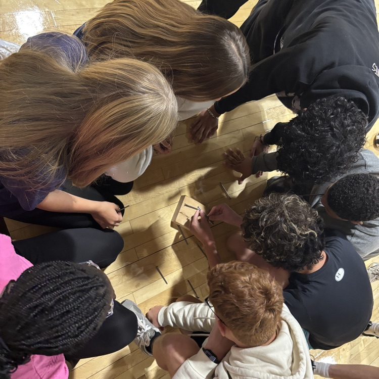 group of freshmen having fun in physical education class