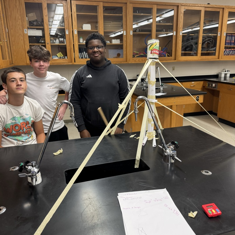 Students with their winning paper tower