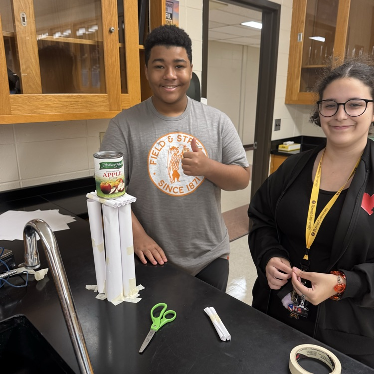 Students with paper tower.