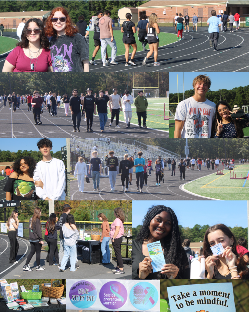 students walking on the track in groups 