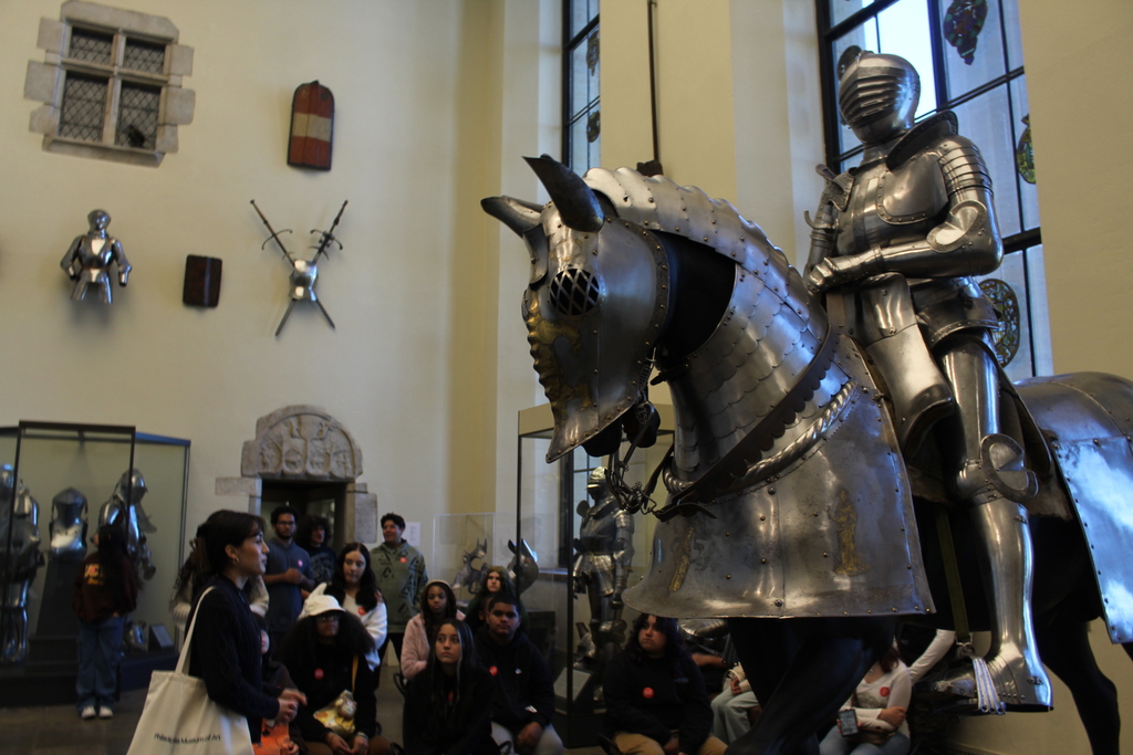 Students learning about armor