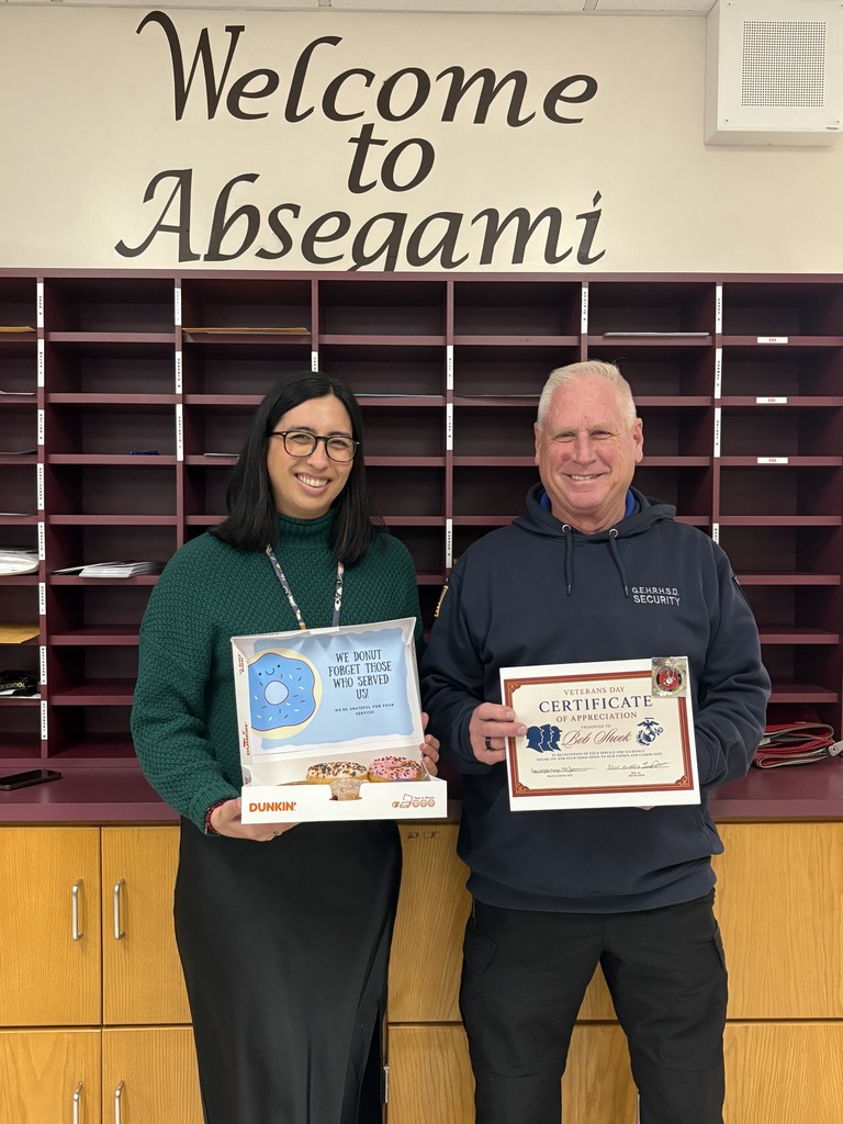 two people standing with a certificate