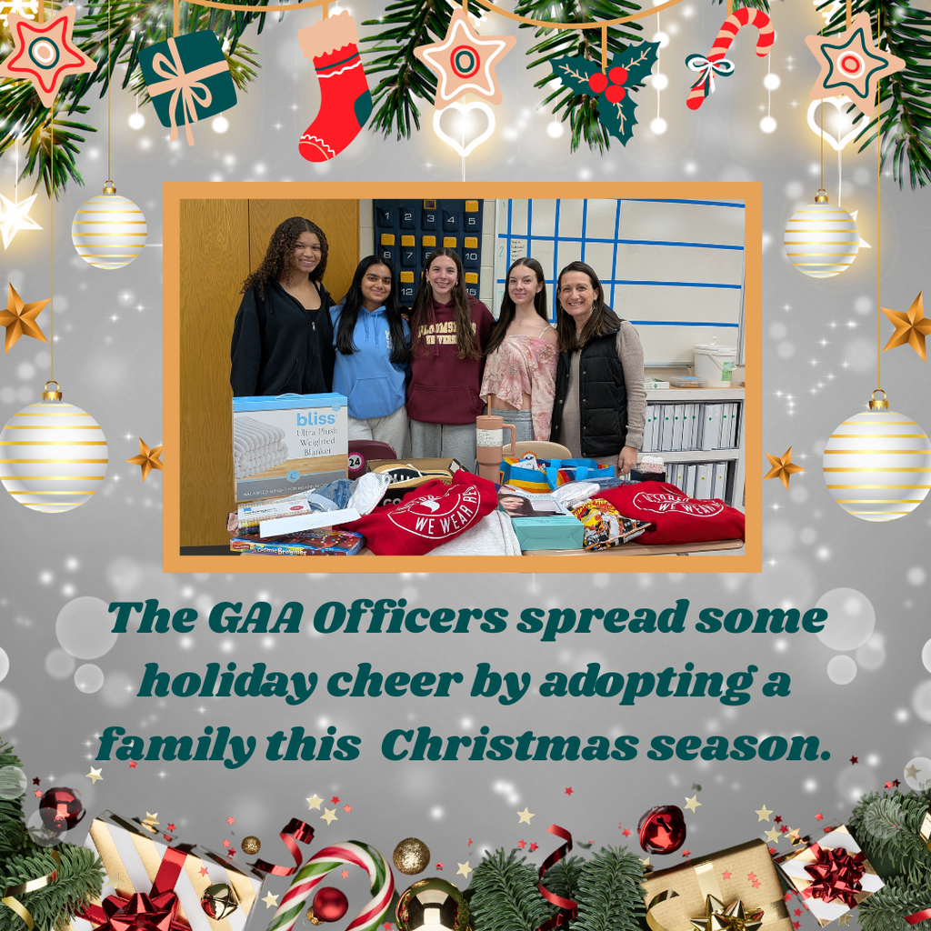 group of students and gifts they purchased for a family