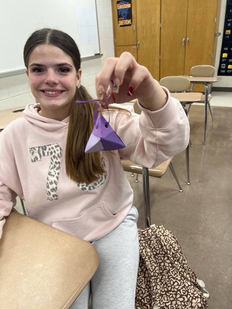 students doing origami 