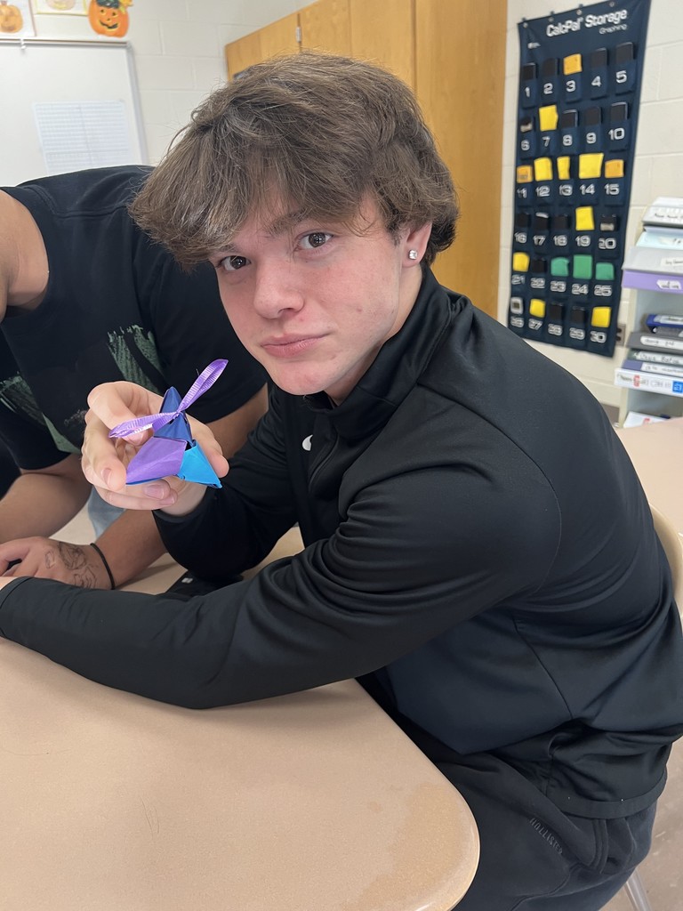 students doing origami 