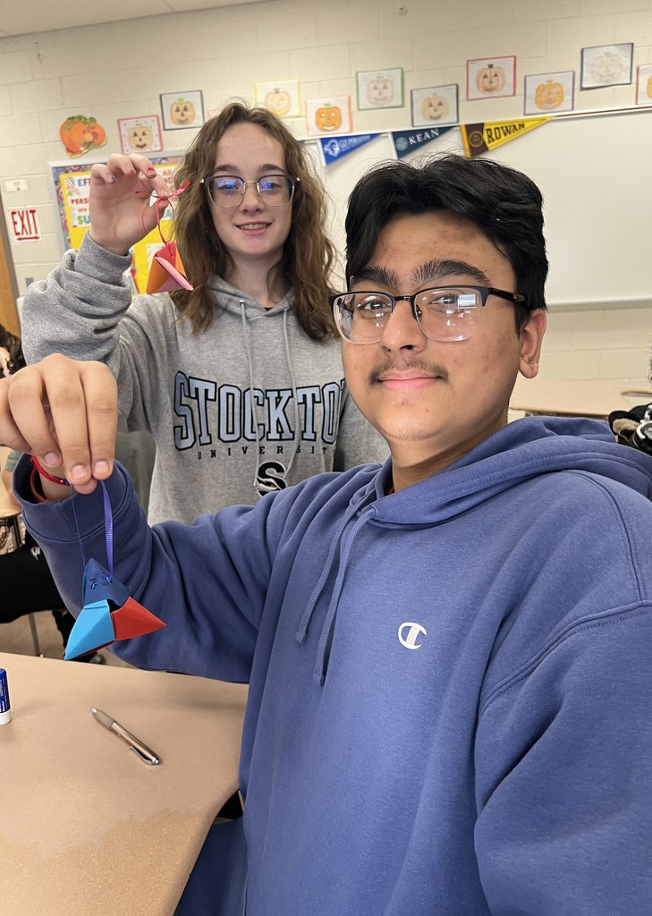 students doing origami 