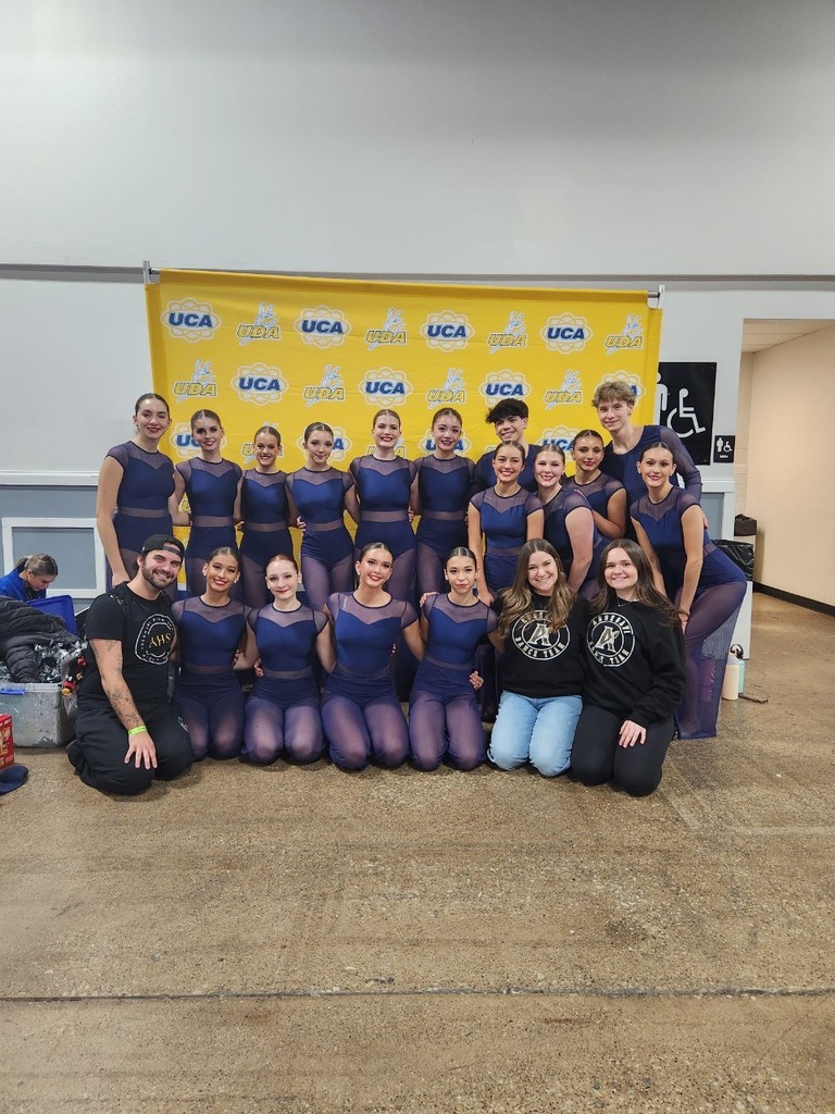 dance team in front of banner