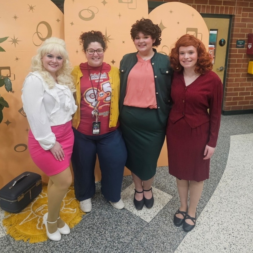 The fabulous leading ladies of 9 to 5, Madeline Torchia, Kaylee Denshuick, and Hannah Kurtz along with their director, Maria Lampe.