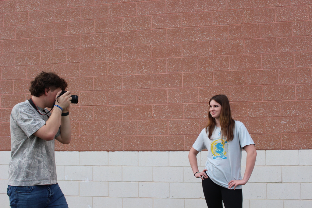 Student taking a photograph.