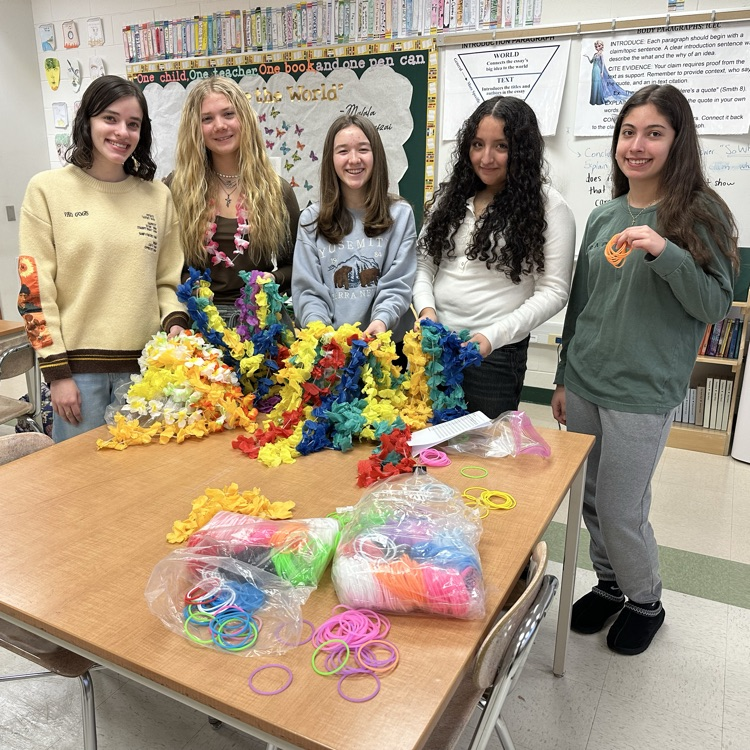  student council with bracelets and Hawaiian leis