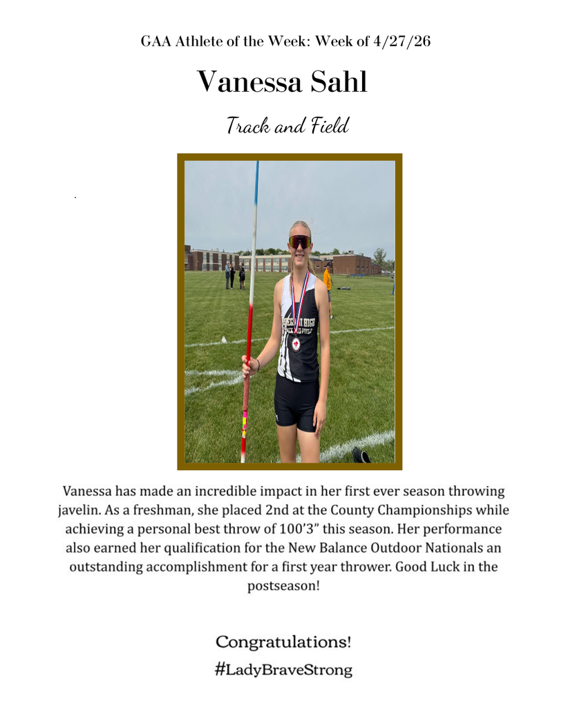 An image of a female athlete holding a pole. She has a medal around her neck and wears sunglasses.