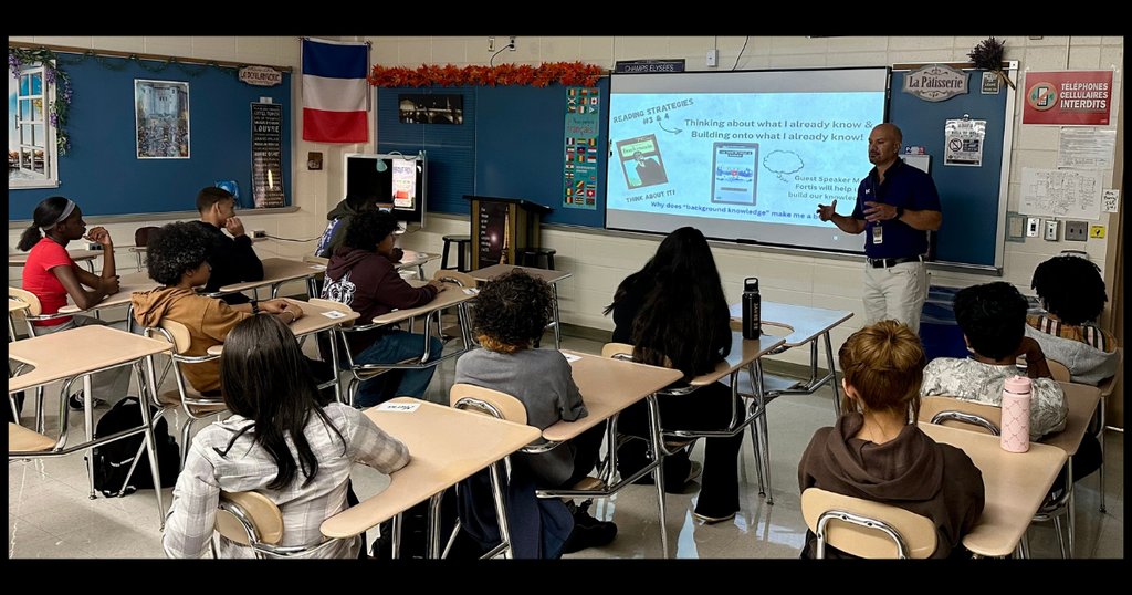 Students listening to a presentation.