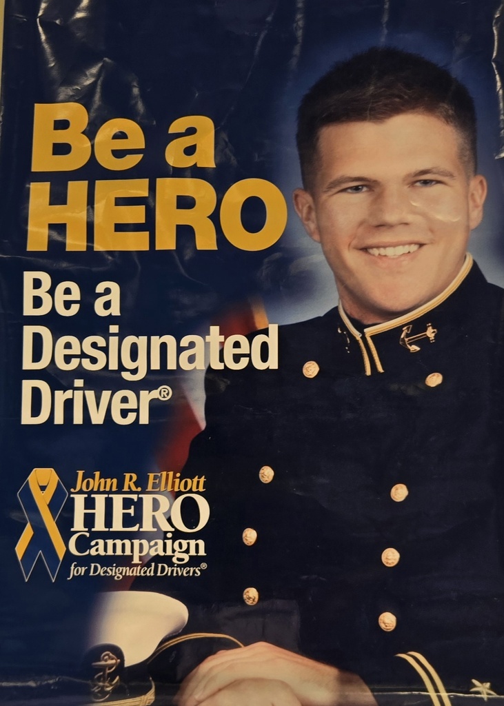 Poster with man in uniform. Text reads, "Be a HERO. Be a Designated Driver". Yellow ribbon and name of campaign.