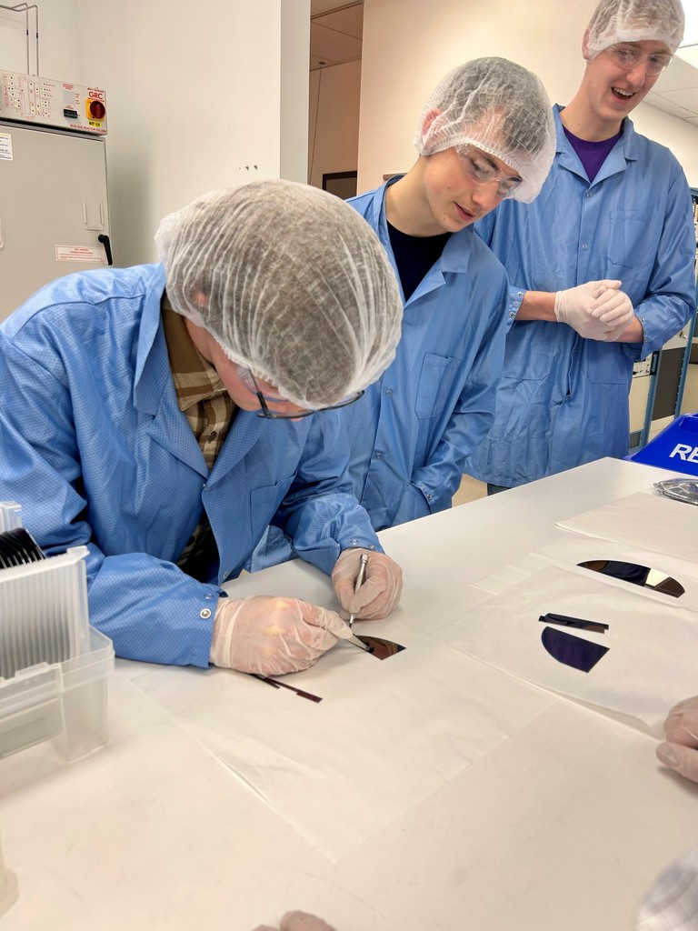 Ethan trying to break the silicon wafer.