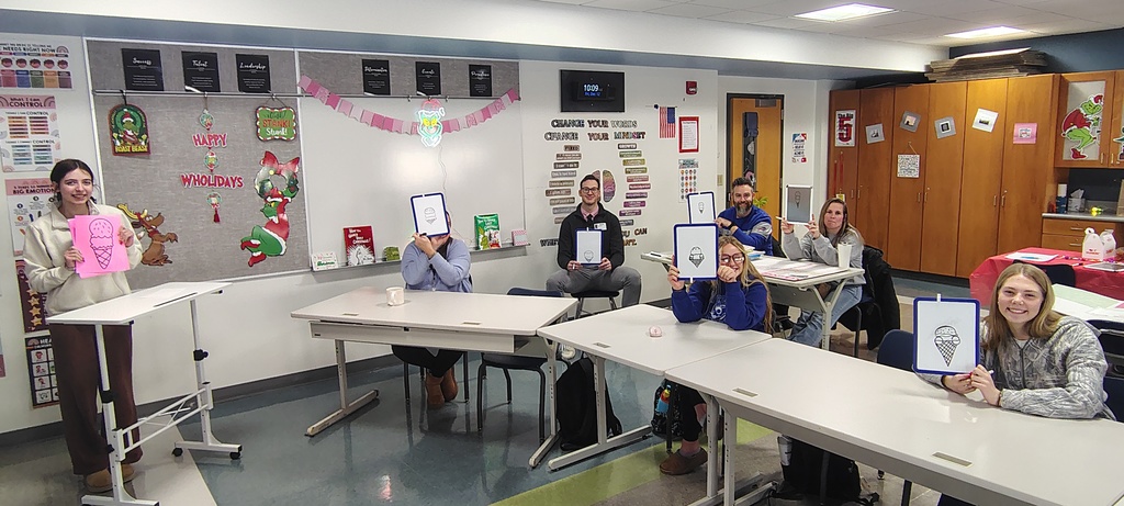 In New Visions Human Services and Education, students are sharpening their communication skills. Here, they’re listening closely and following step by step directions to draw a surprise picture — and it looks like the Counselors and Principals were excellent listeners too