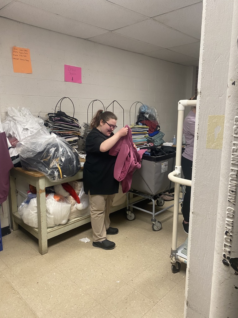 intern folding laundry