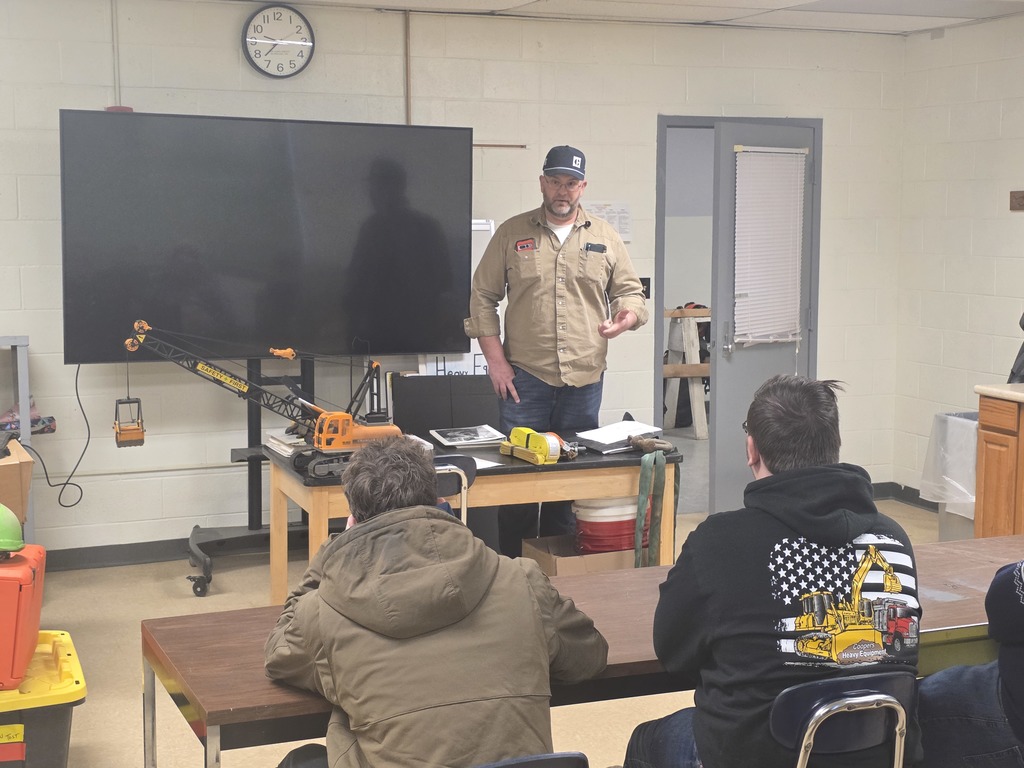 Garrett explaining load charts to some senior students 