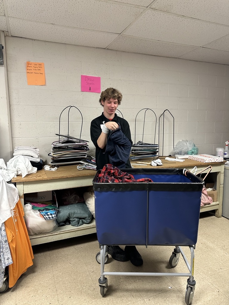 intern folding laundry
