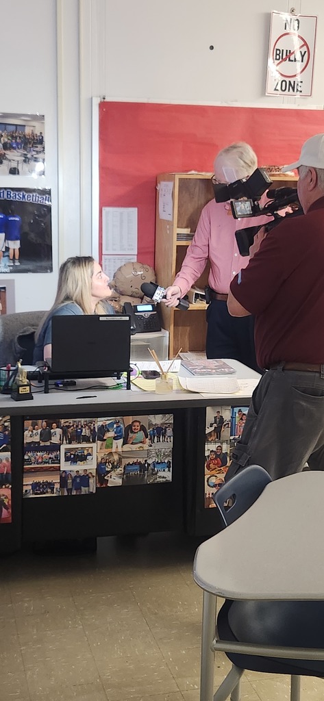 Adult being interviewed by the media