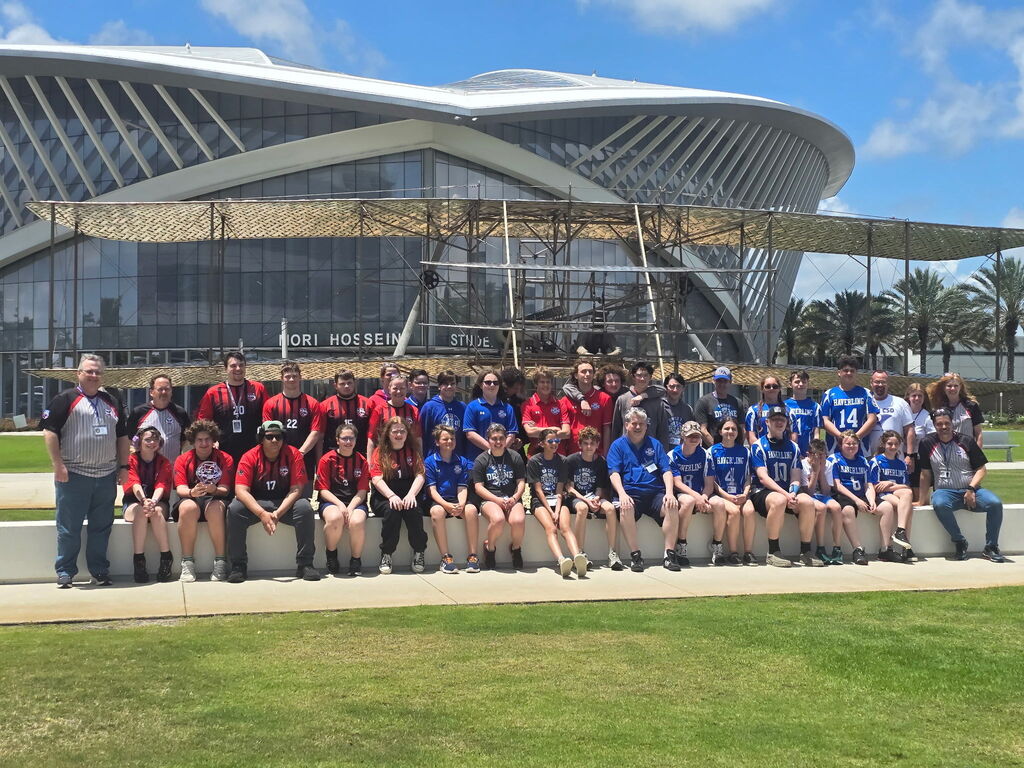 Group photo of drone soccer teams at National event.