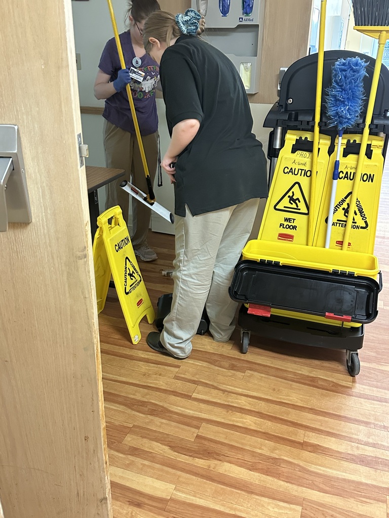 intern mopping floor
