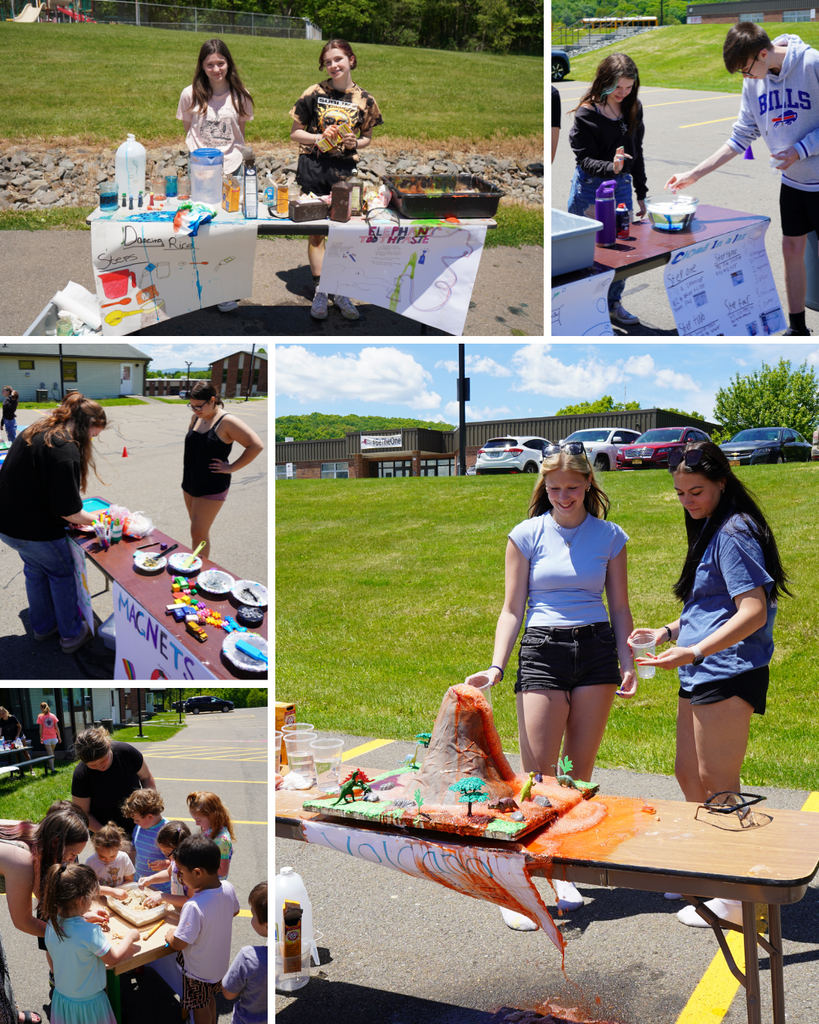 Early Childhood students showcasing their science experiments at tables for students to explore.