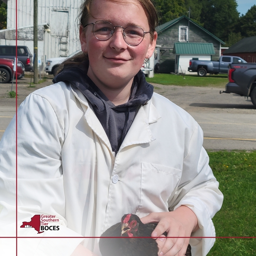 Image of a student participating in the Chicken Show on Saturday.