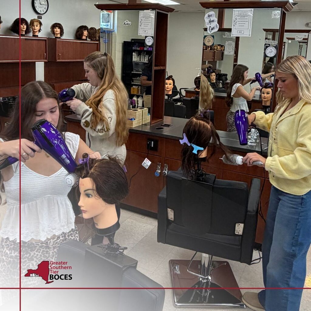 Bush Campus Cosmetology students practicing round brush techniques