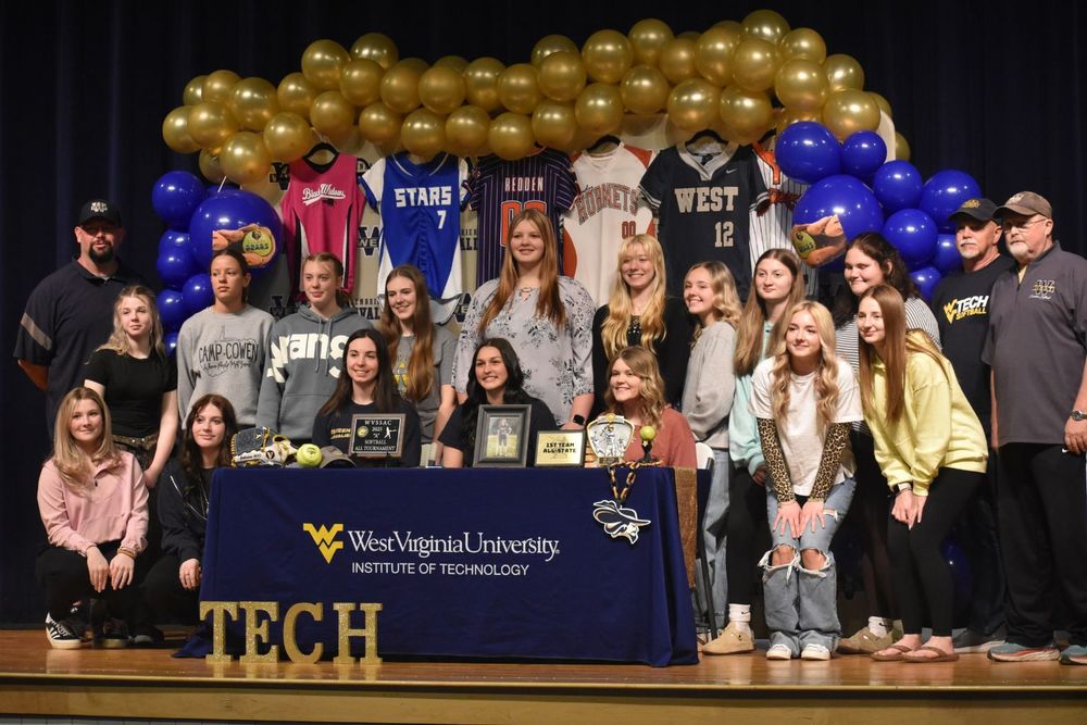 Friends and Family at WVU signing