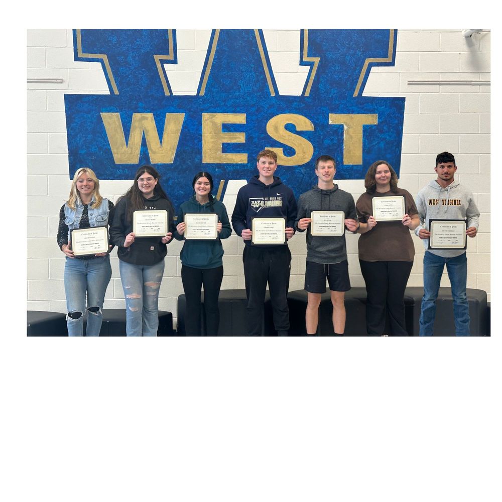 Students infront of West Design