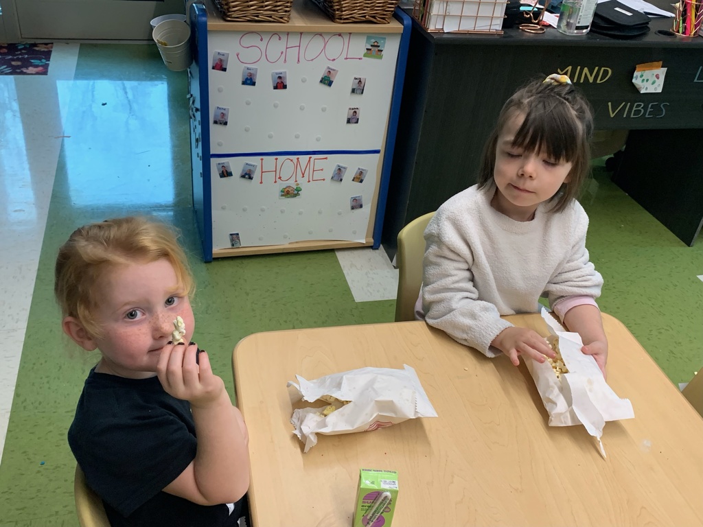 Preschool eating popcorn from PTO