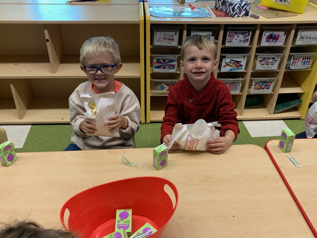 Preschool eating popcorn from PTO
