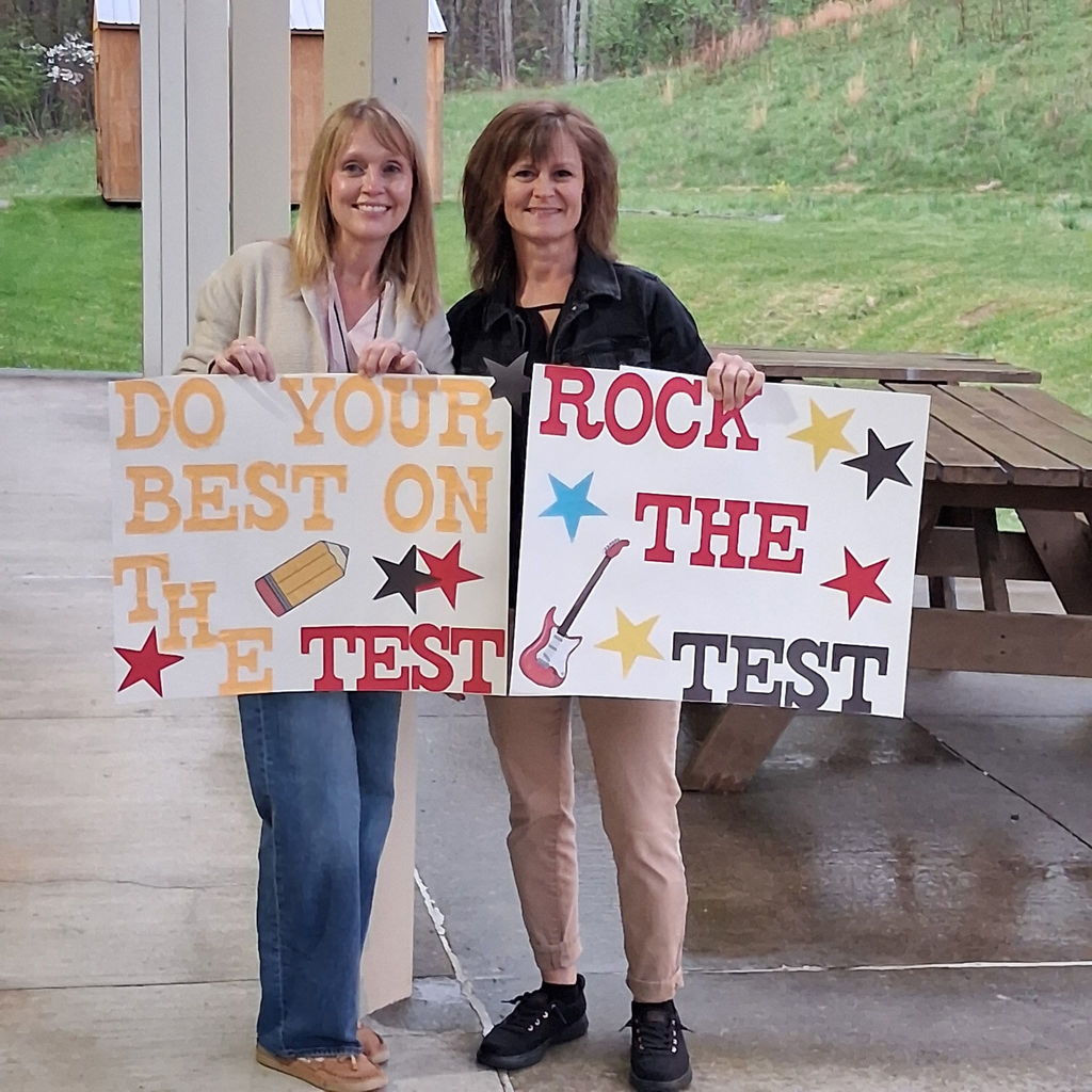 The principal and Title I teacher cheering students to do their best on the state assessment