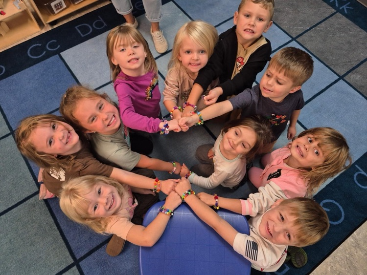 Happy kids with their friendship bracelets 