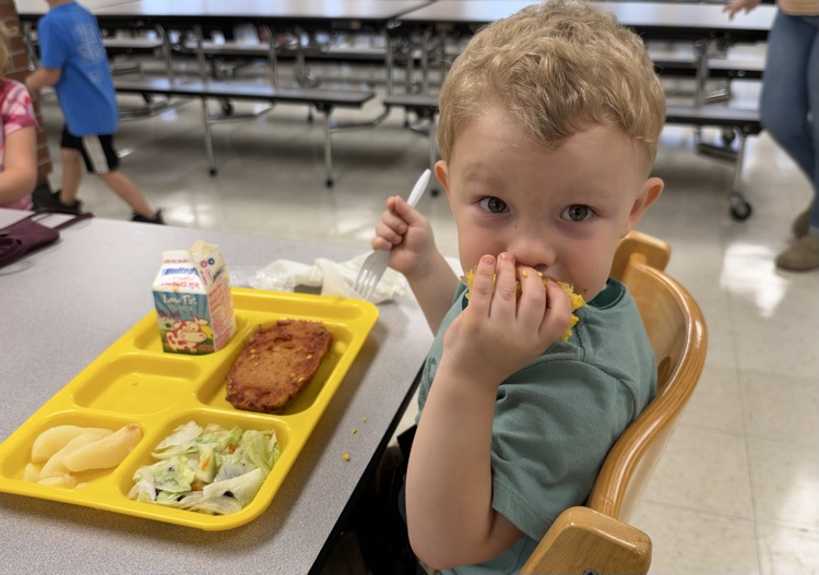 students eating corn