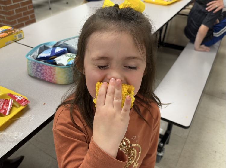 students eating corn