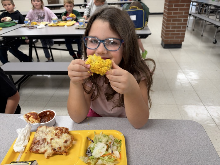 students eating corn